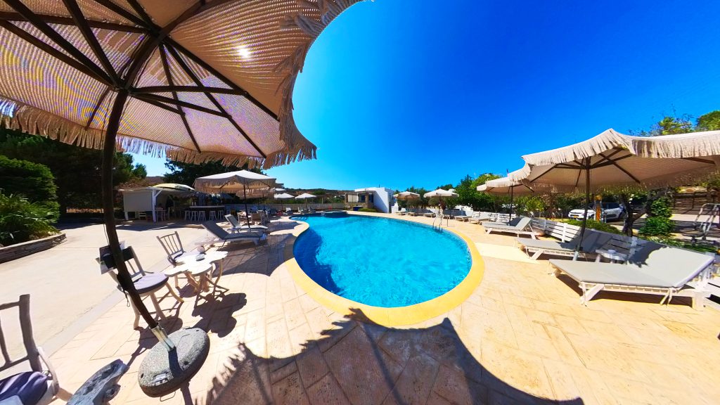 360° image of hotel pool and sunbeds in Kea during summer, from Virtual Tour services by Perigon Perspective.