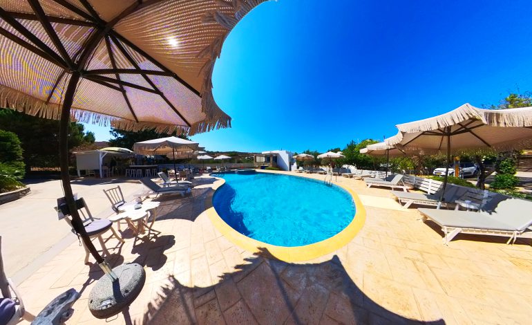 360° image of hotel pool and sunbeds in Kea during summer, from Virtual Tour services by Perigon Perspective.